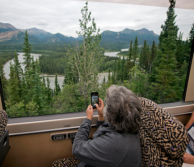 Guests on a Holland America Line cruisetour enjoy the scenic landscape of interior Alaska while riding the McKinley Explorer to Denali. Holland America Line's Cruisetours combine an Alaska cruise with an inland journey.