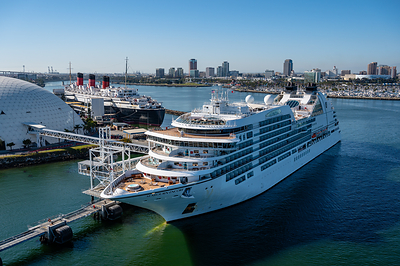 Seabourn Encore Makes Maiden Arrival to the Continental U.S. with First-Ever Call in California, docking at the Long Beach Cruise Terminal alongside the legendary Queen Mary.
